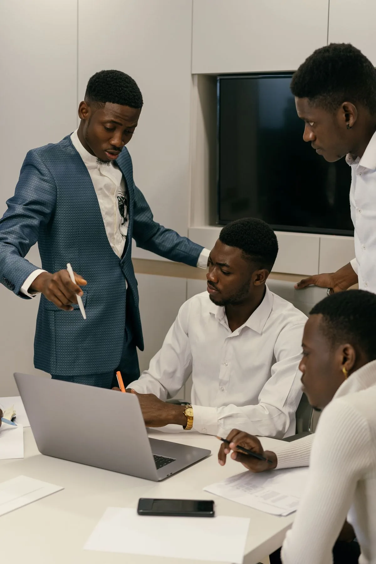 Softserve engineers reviewing work together on a laptop