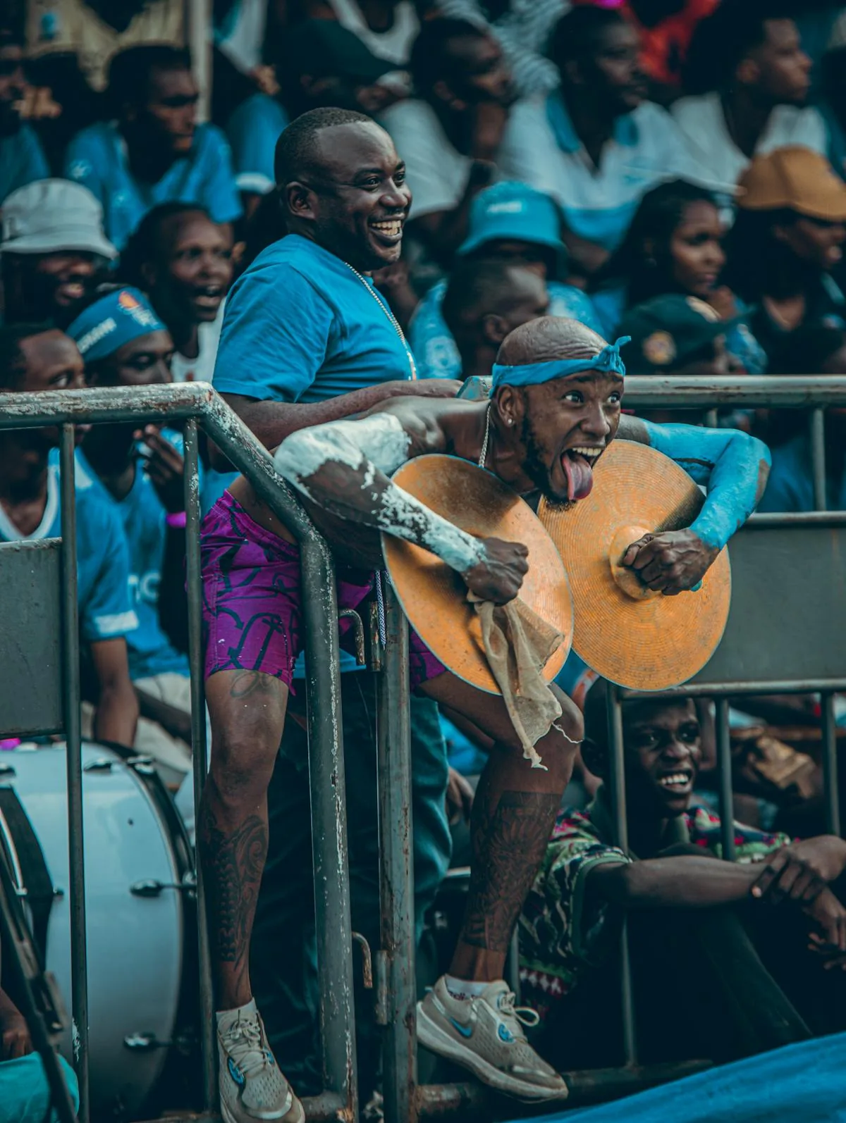 An energetic African live event crowd enjoying a performance